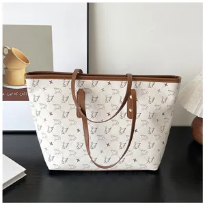 Vintage large capacity tote bag for women with elegant swan pattern and brown leather trim.