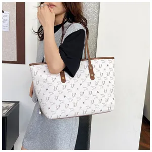 Stylish large capacity women's tote bag with swan pattern, elegant shoulder commuter bag.