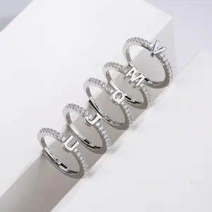 Adjustable silver letter ring with sparkling cubic zirconia, stylish fashion initial jewelry for women.