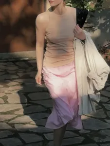 French style pink asymmetrical fishtail midi skirt for women, elegant daily wear outfit.