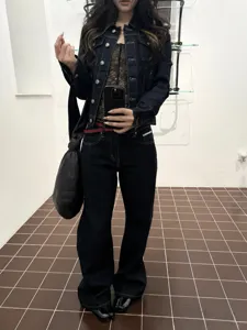 Dark denim jacket and pants set, vintage slim fit denim outfit with contrast stitching details.