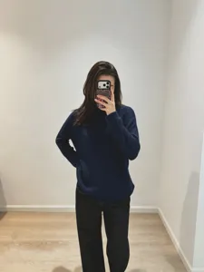 Cozy dark blue long sleeve turtleneck knit sweater, loose fit casual pullover for autumn wear.