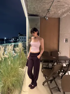 Women's stylish split-toe yoga pants and halter top set, slim fit casual fitness wear.