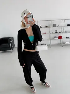 Stylish women's stacked waist stirrup yoga pants, comfortable drape slimming fitness leggings.