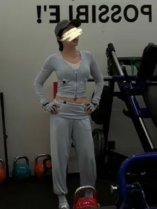 Detailed view of the stylish activewear set in a gym scene, featuring comfortable stretchy fabric.