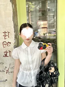 Korean style white short sleeve blouse featuring Peter Pan collar and delicate lace details.