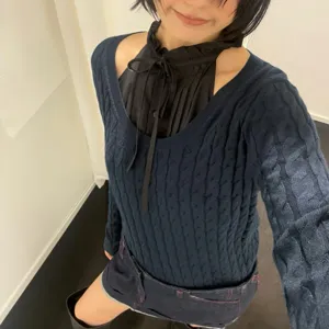 2026 New women's stylish long sleeve cable knit sweater with layered black ruffle collar top.