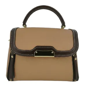 Detailed view of the stylish contrast color leather handbag, featuring elegant stitching and hardware.