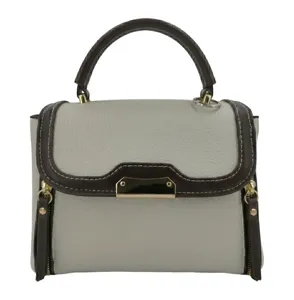 Grey and dark brown contrast color women handbag with top handle and metal lock detail.