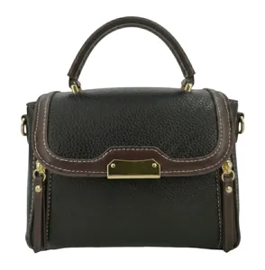 Detailed view of the contrast leather handbag, highlighting premium texture and metal hardware.