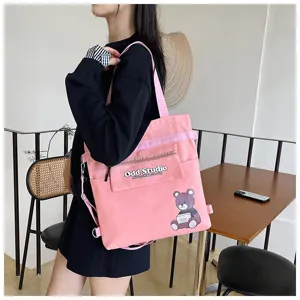 Rosa Canvas Umhängetasche Rucksack mit Bärenprint Detail, vielseitige College Tasche.