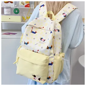 Cute yellow canvas backpack with adorable dog print, ideal school bag for teenage girls.