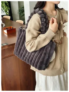 Dark grey plush tote bag for women, cozy winter fluffy shoulder handbag with unique bubble strap.