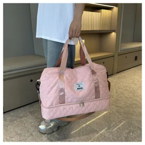 Large capacity pink quilted travel duffel bag for gym yoga casual daily use and sports.