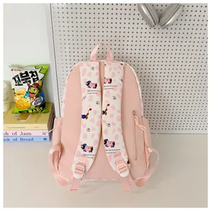 Pink student backpack school bag for teenage girls ins style casual daypack with cute straps.