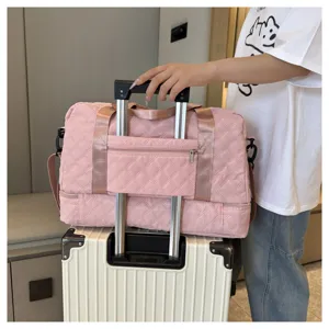 Pink quilted travel duffel bag with luggage sleeve, large capacity fitness gym bag for women.