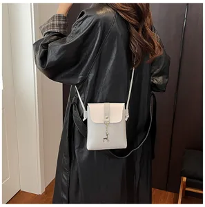 Mini crossbody phone bag featuring a chic contrast design and cute deer charm for women.