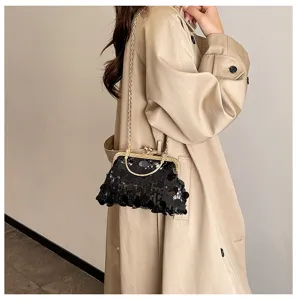 Chic black sequin kiss-lock chain bag detail shot, stylish single shoulder crossbody purse.