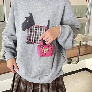 Mini pink crossbody bag for women, cute luxury handbag with chain strap and metal lock charm.