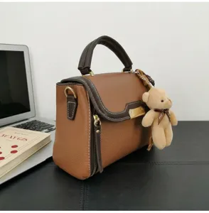 Women color-blocked shoulder handbag stylish casual top-handle crossbody bag with cute bear.