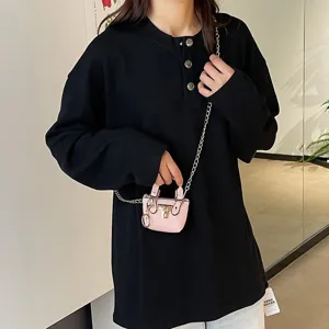 Women mini pink crossbody shoulder bag with metal chain and cute lock design for daily fashion.