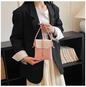 Mini shoulder phone bag for women, stylish pink and white crossbody bag with cute deer pendant.