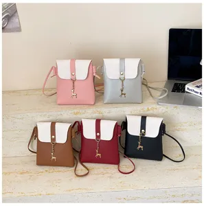 Korean style mini crossbody phone bag, fashionable leather shoulder bag with cute deer pendant.