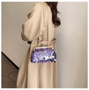 Purple sequin chain shoulder bag detail shot, showing sparkling texture and metallic kiss-lock.