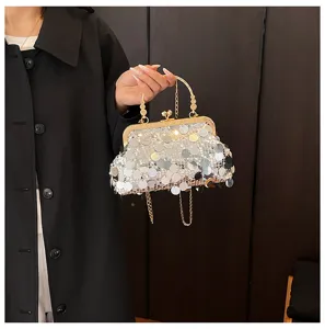 Detailed view of the stylish sequined evening clutch bag with gold-tone kiss-lock frame and chain strap.