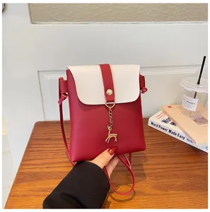 Korean style mini crossbody phone bag, chic red and white design with cute deer pendant.