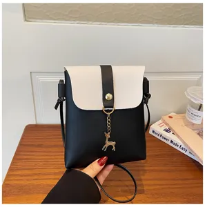 Mini black and white crossbody phone bag with cute deer pendant, stylish women's shoulder bag.