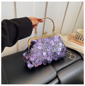 Women purple sequin clutch bag with gold metal frame and chain strap, fashion party