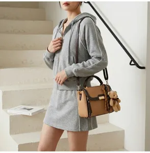 Chic contrast color shoulder bag for women, stylish crossbody handbag with cute bear.