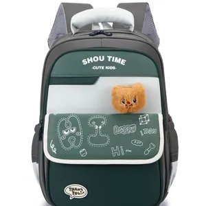 Stylish color-block school backpack for kids with cute bear pendant and spacious capacity main view