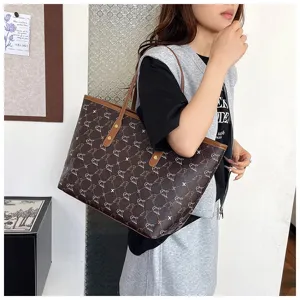 Brown vintage tote bag for women, large capacity shoulder bag with elegant bird pattern design.