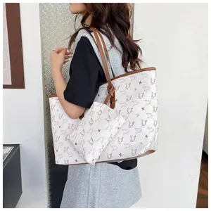 Large capacity retro tote bag set for women with swan print and brown shoulder straps.