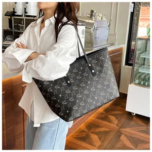 Large capacity vintage tote bag for women, stylish patterned single shoulder commuting bag.