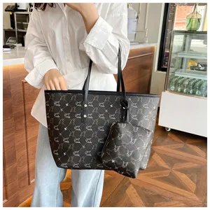 Versatile large capacity black tote bag with matching pouch, retro commuter shoulder bag.