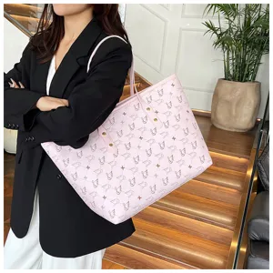 Detail view of the pink large capacity shoulder tote bag featuring elegant swan monogram pattern.