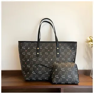 Elegant large capacity tote bag and matching pouch set with stylish monogram pattern for women.