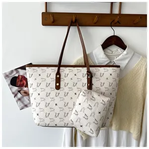 Large capacity vintage tote bag detail showcasing stylish swan print and matching pouch.