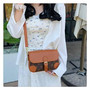 Fashion monogram crossbody bag for women, stylish brown leather shoulder bag, casual purse.