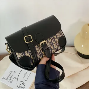 Stylish shoulder crossbody bag with classic monogram pattern and black leather flap design.