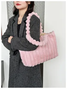 Detail view of the autumn winter plush tote bag, pink fluffy shoulder bag for women.