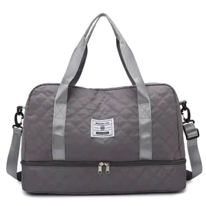 Quilted travel duffel bag with separate bottom compartment, large capacity fitness gym bag.