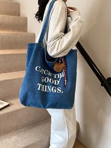 Stylish blue denim tote bag for women, large capacity canvas shoulder bag with letter print.