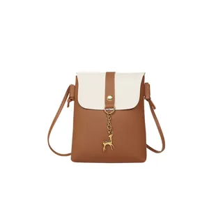 Mini phone crossbody bag for women, stylish small shoulder bag with cute deer charm.