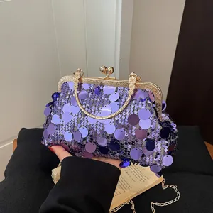 Stylish purple sequin chain shoulder bag with metallic kiss lock frame for women.