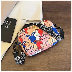 Cute cartoon rabbit print crossbody bag with fashion strap casual shoulder bag for daily use.