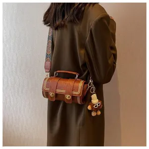 Retro Zylinder Umhängetasche für Damen, lässige Nische Design PU Leder Handtasche mit breitem Gurt.